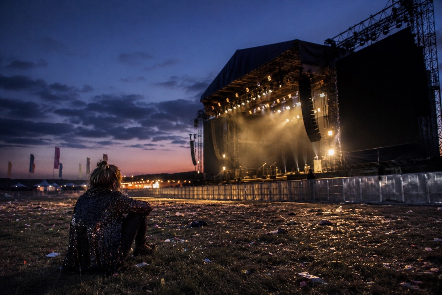 Outdoor music festival crowd at a park venue